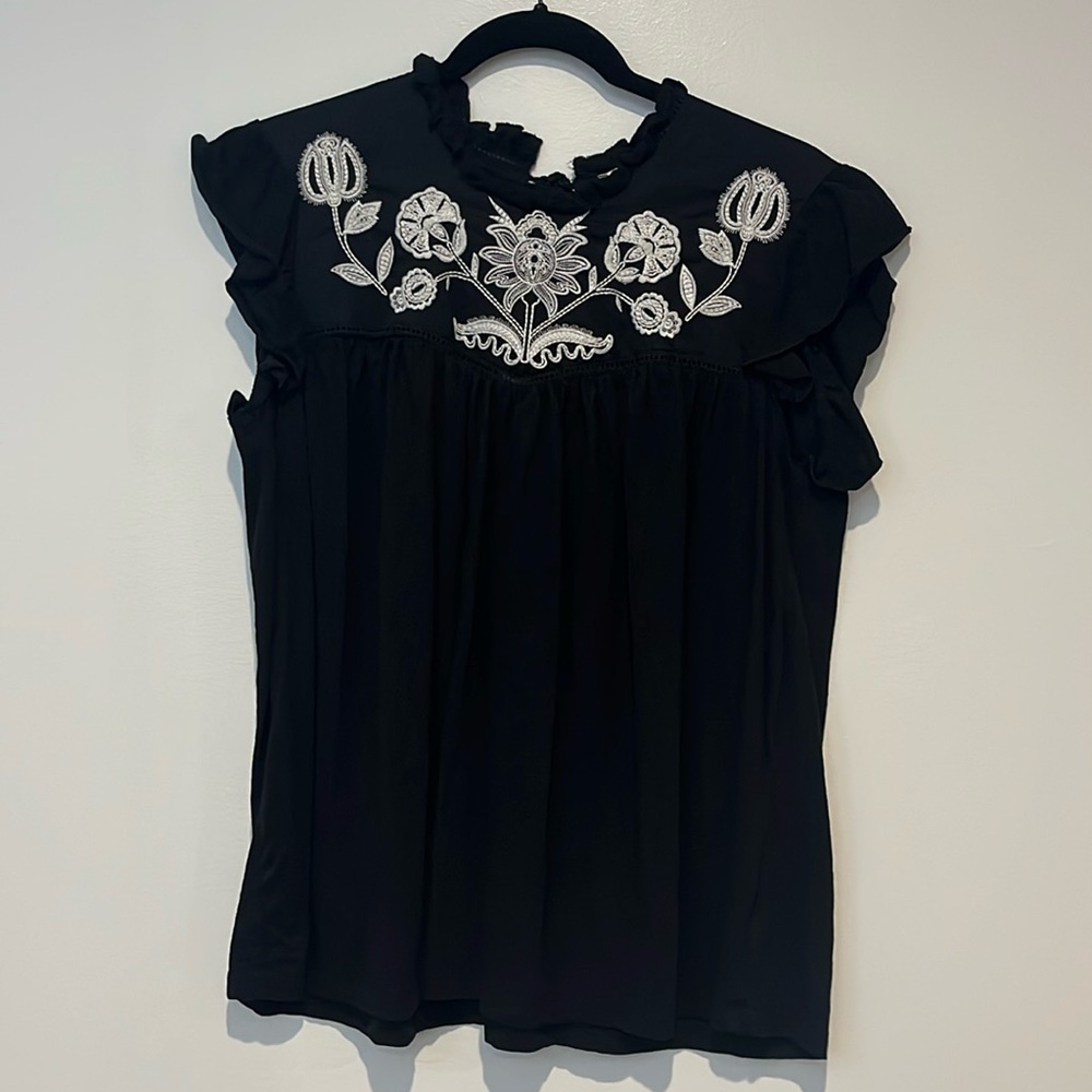 Black top with white embroidery and cap sleeves!